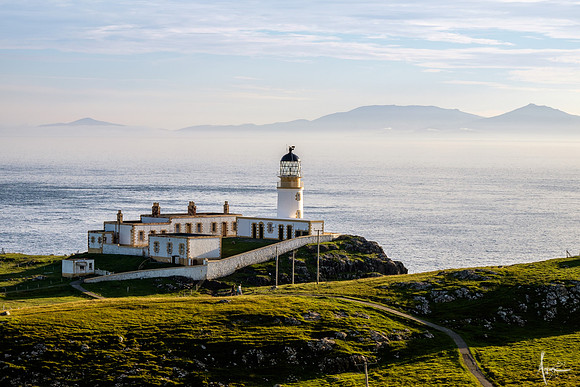 Neist point lighthouse with Uist in the background, Skye