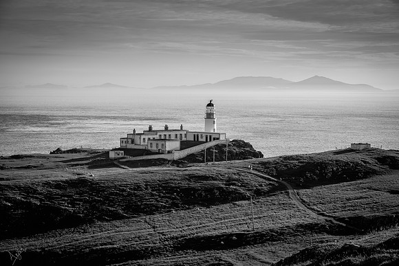 Neist point lighthouse with Uist in the background, Skye